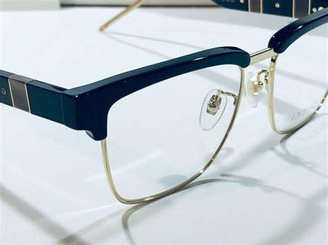 brown gucci eye glasses|Gucci black frame glasses.